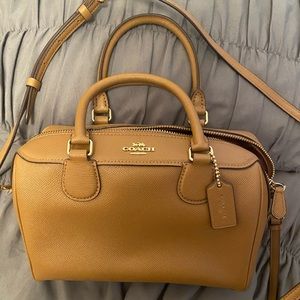 Coach small side purse with crossbody strap included